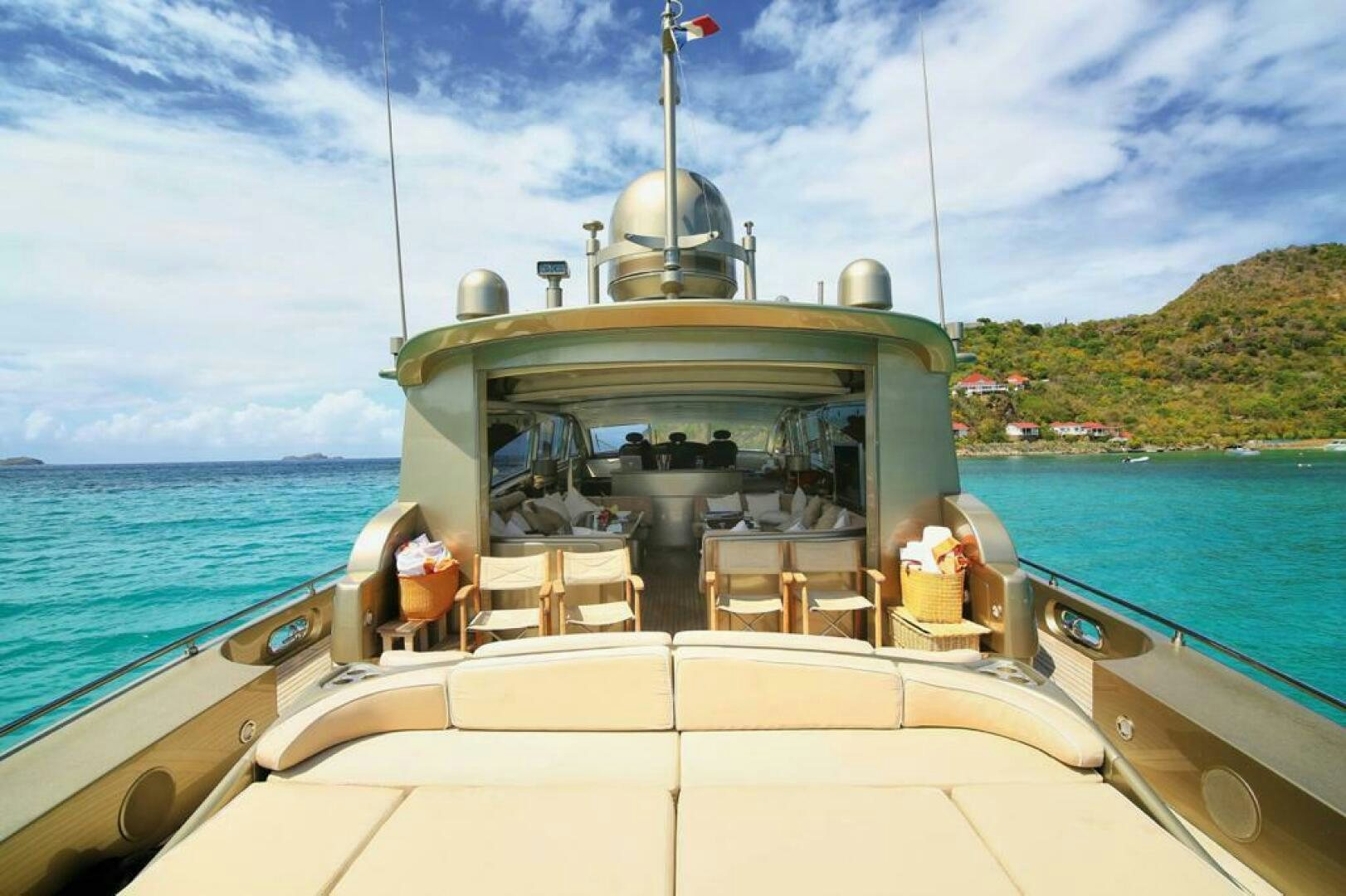 a boat with a large antenna on the back aboard TENDER TO Yacht for Sale