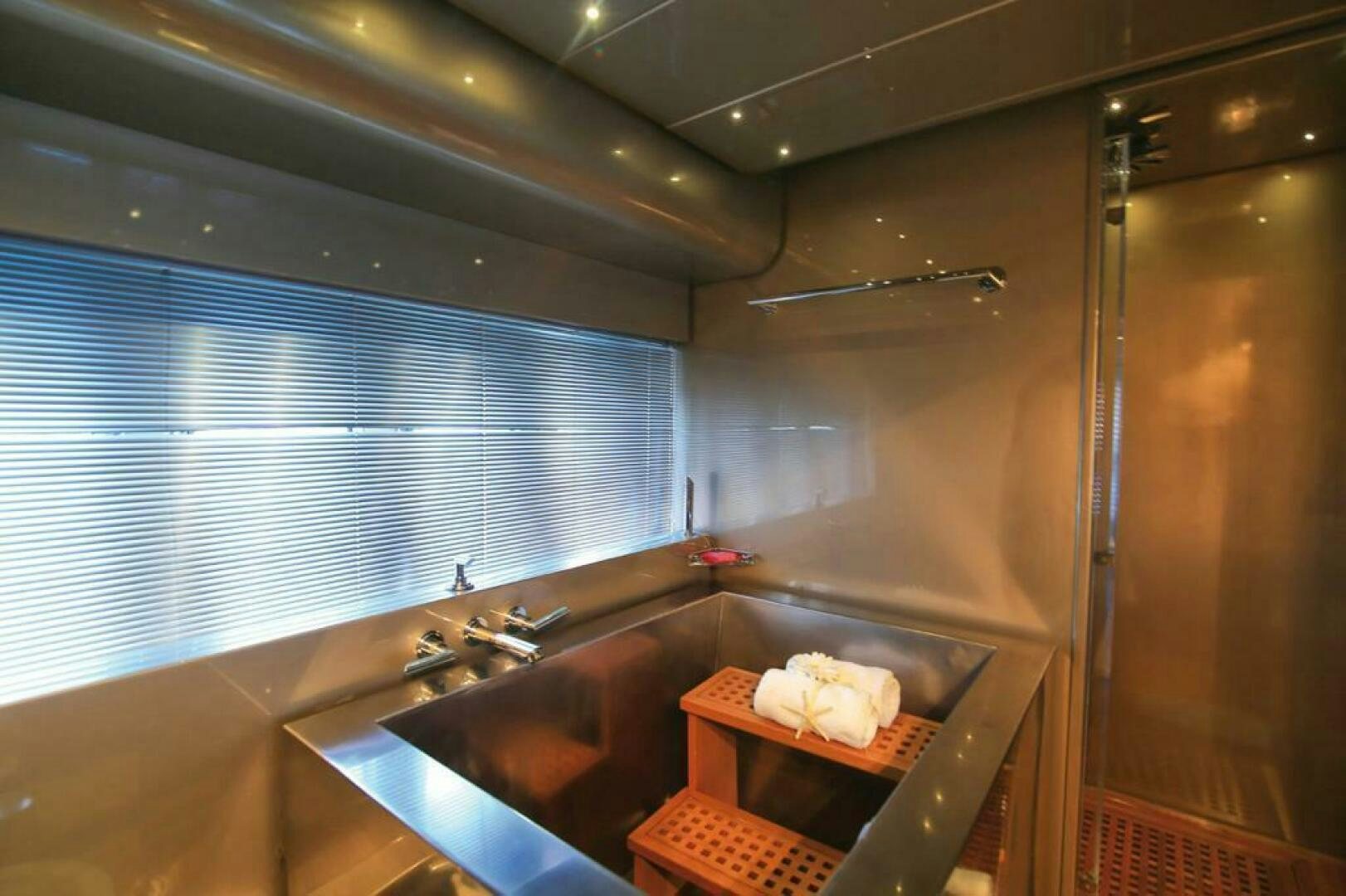 a bathroom with a sink and a countertop aboard TENDER TO Yacht for Sale