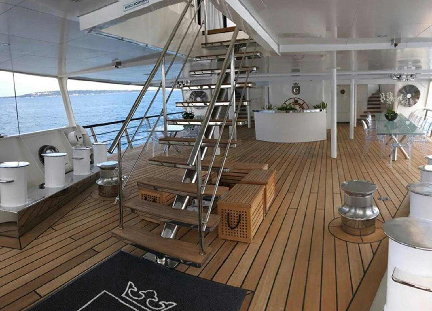 a ladder on a wood deck aboard CHAKRA Yacht for Sale