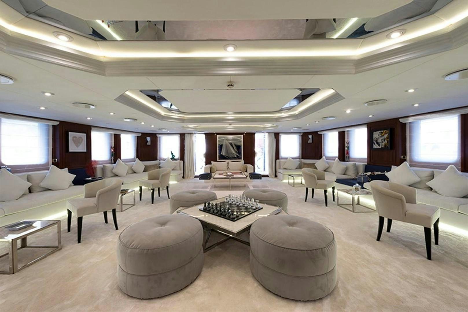 a room with chairs and a table aboard CHAKRA Yacht for Sale