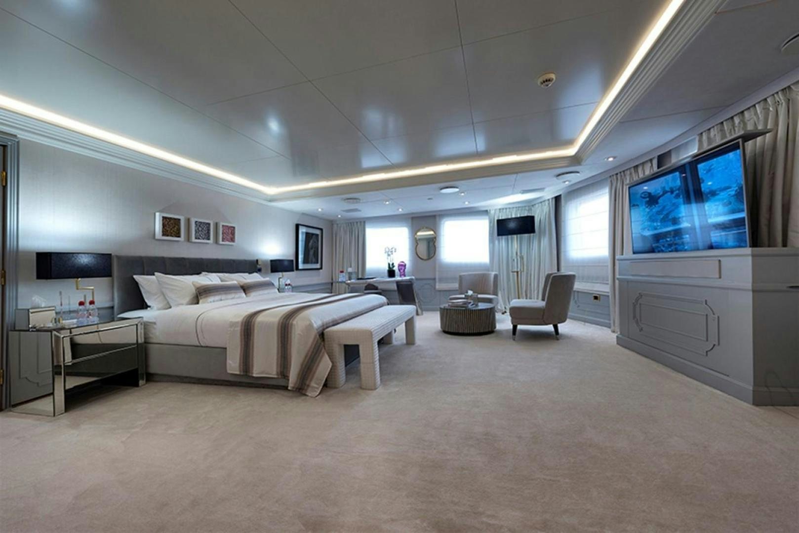 a large bedroom with a large bed aboard CHAKRA Yacht for Sale