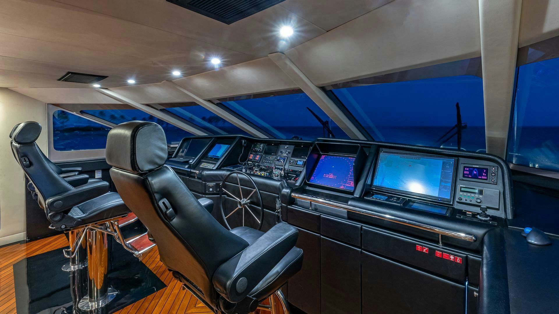 inside of a vehicle with computers aboard SWEET ESCAPE Yacht for Sale