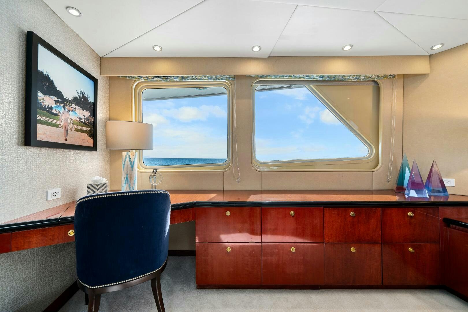 a room with a chair and a desk aboard SWEET ESCAPE Yacht for Sale