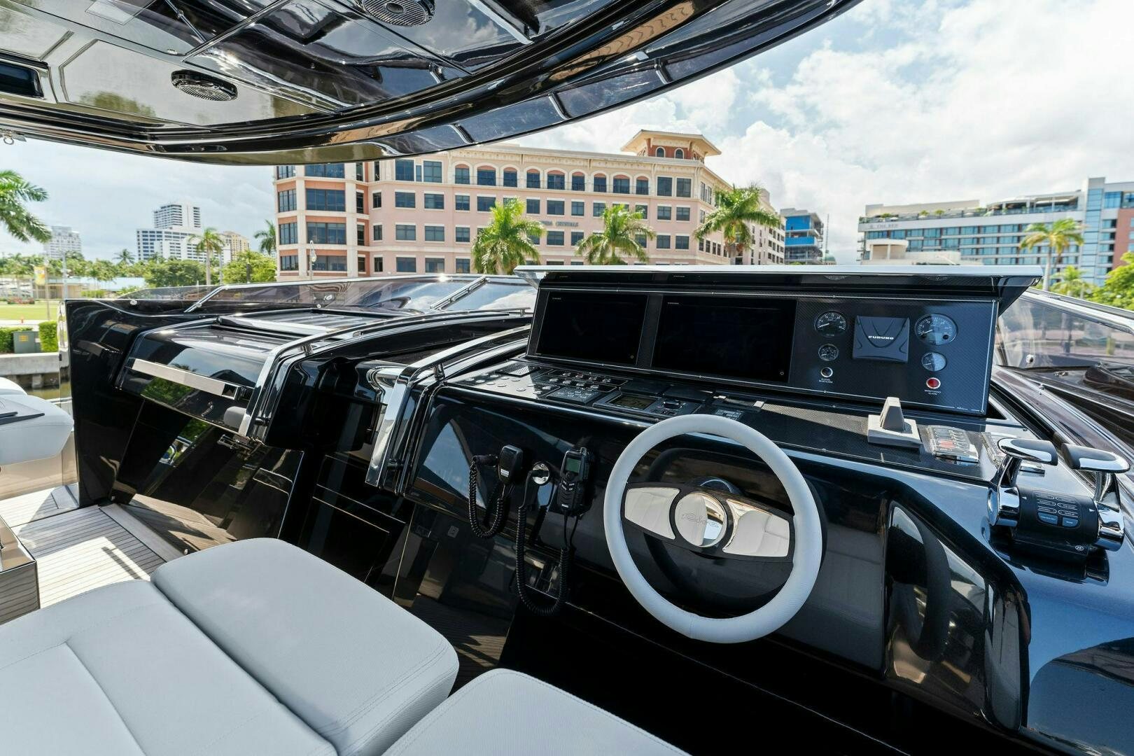 inside of a car aboard RIVA 110/29 Yacht for Sale