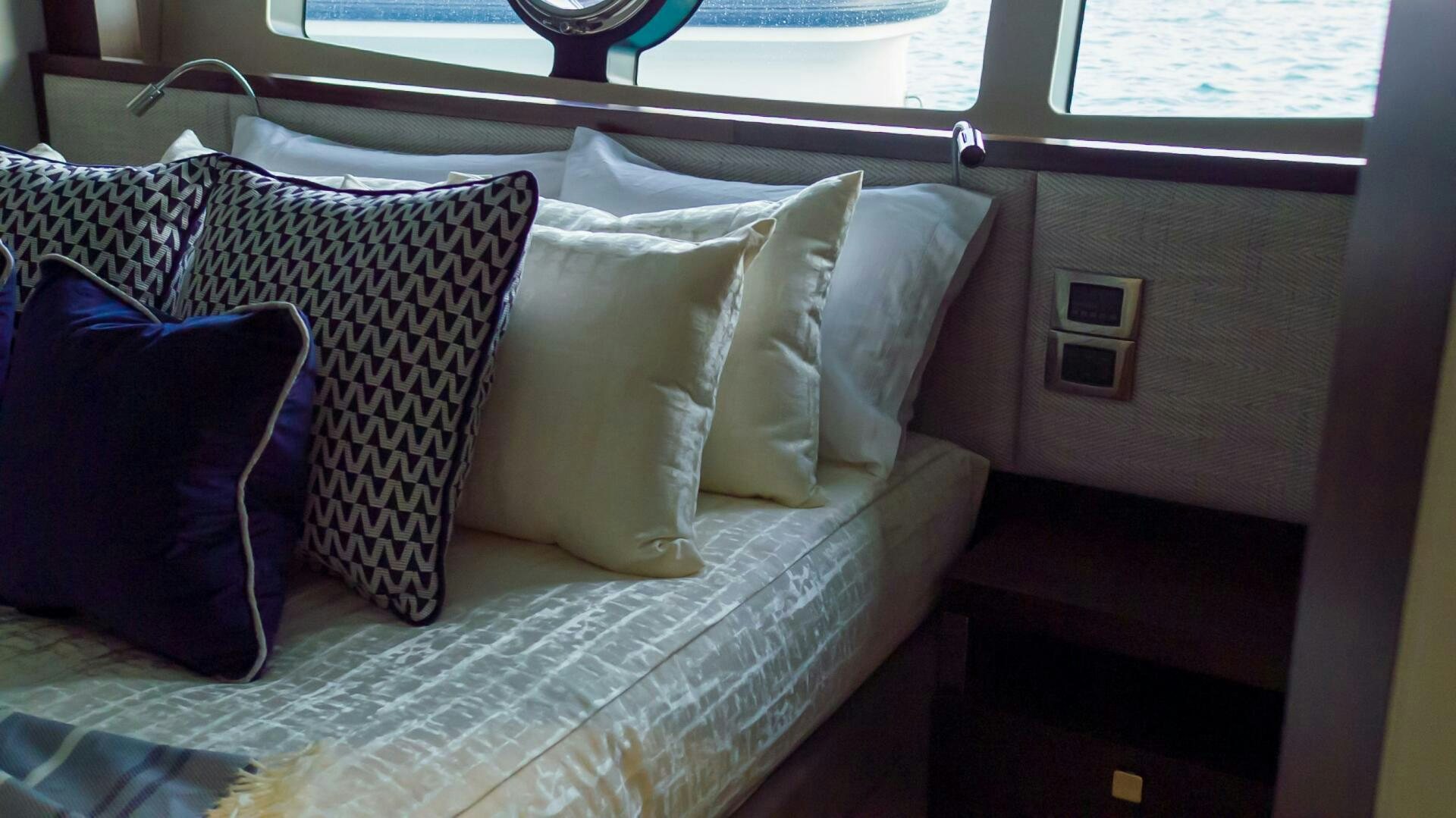 pillows on a bed aboard MR. K IRISTON Yacht for Sale