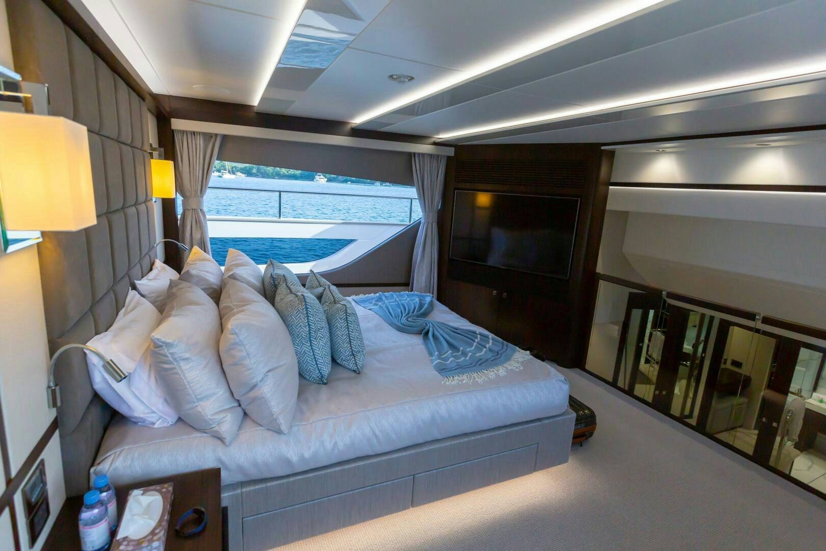 a bed with pillows and pillows aboard MR. K IRISTON Yacht for Sale