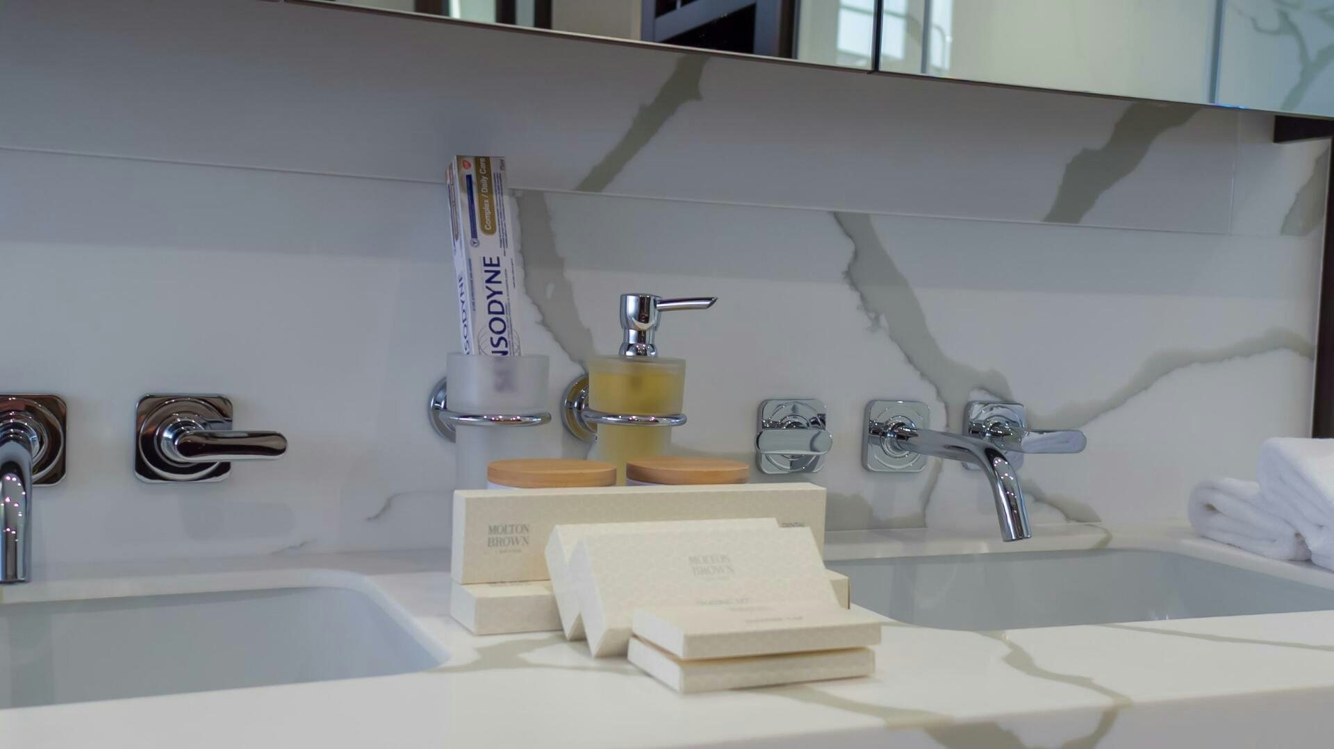 a sink with a faucet and a soap dispenser aboard MR. K IRISTON Yacht for Sale