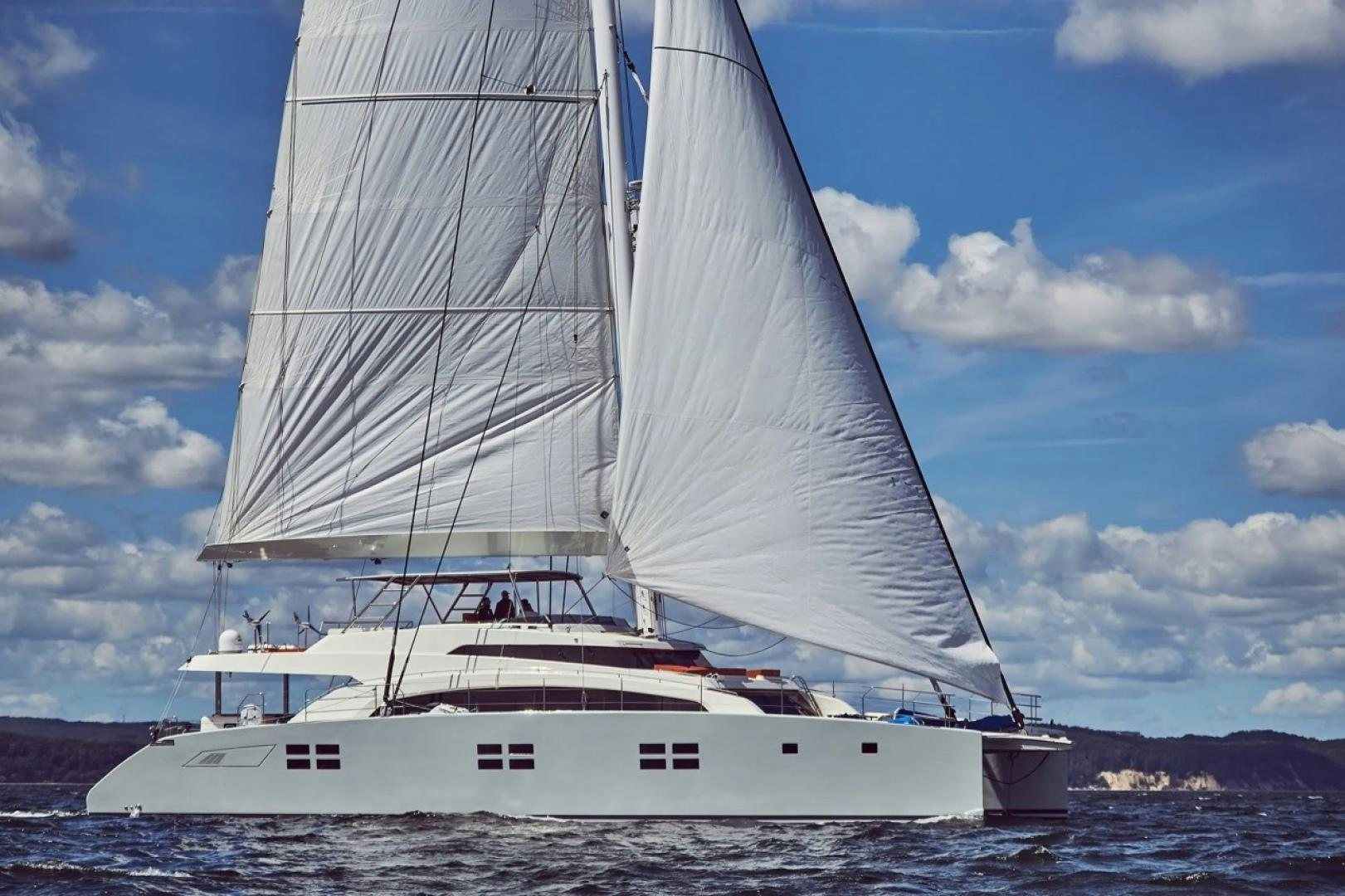 a white boat on the water aboard LITTLE GIANT Yacht for Sale