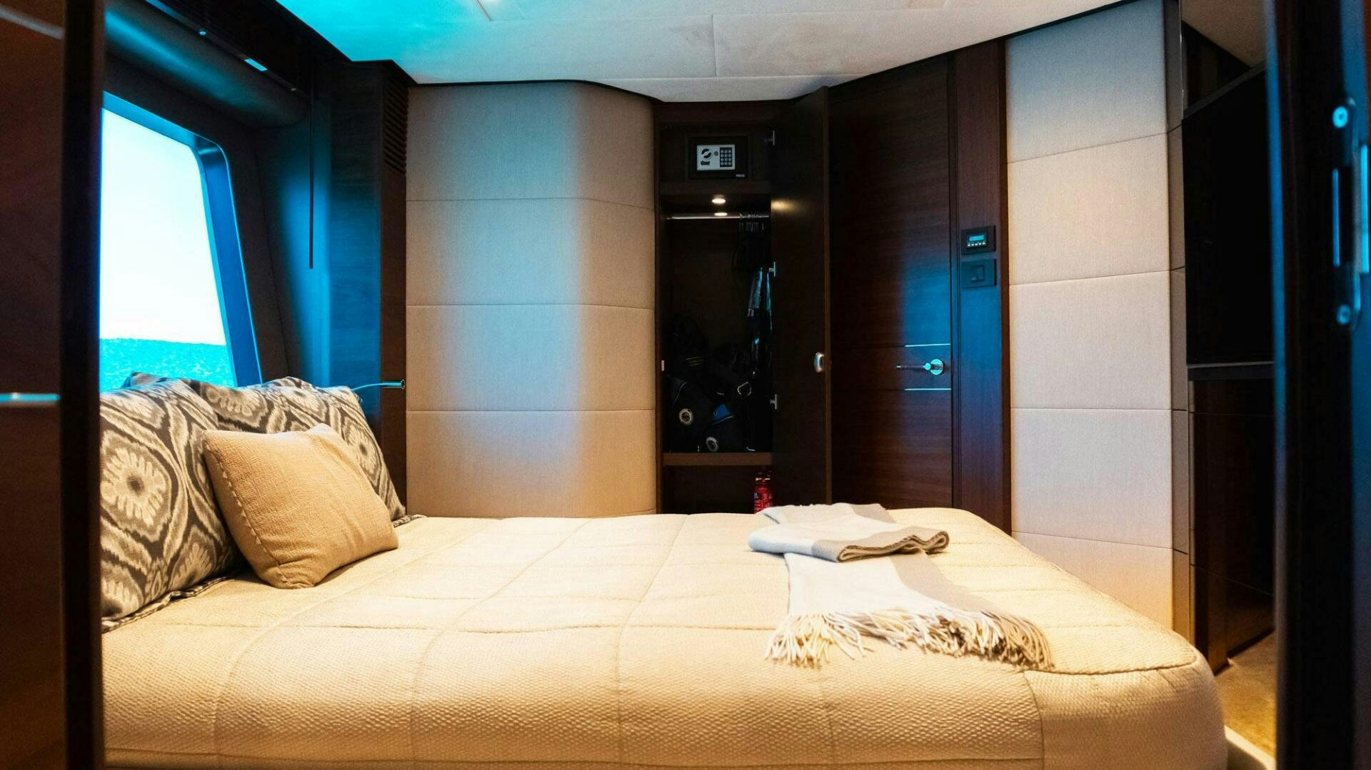 a bed with pillows aboard SATORI Yacht for Sale