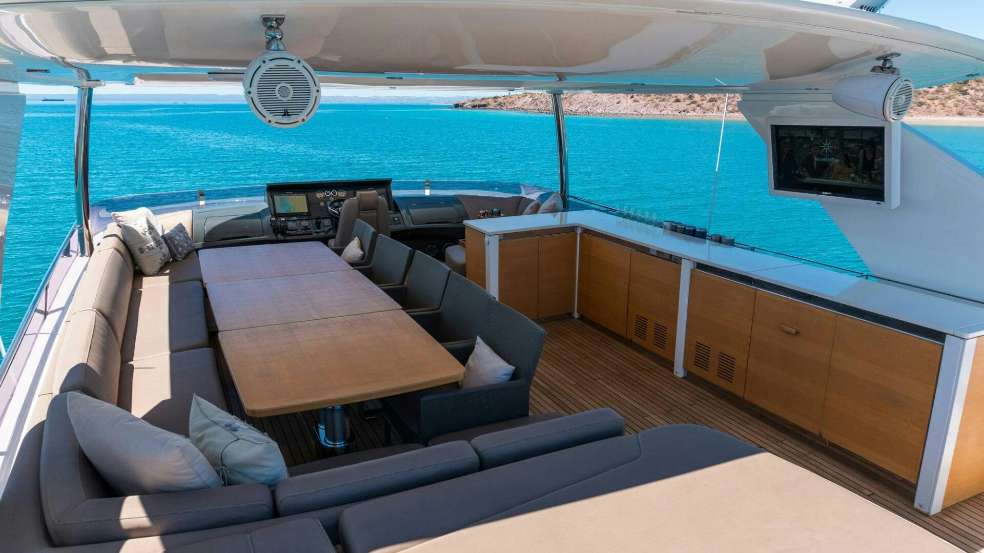 a large boat with a couch aboard SATORI Yacht for Sale