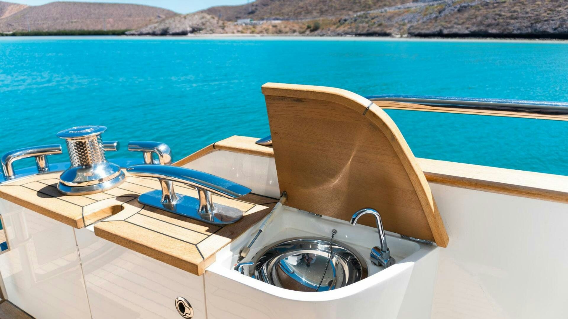 a bathtub with a sink and a faucet aboard SATORI Yacht for Sale
