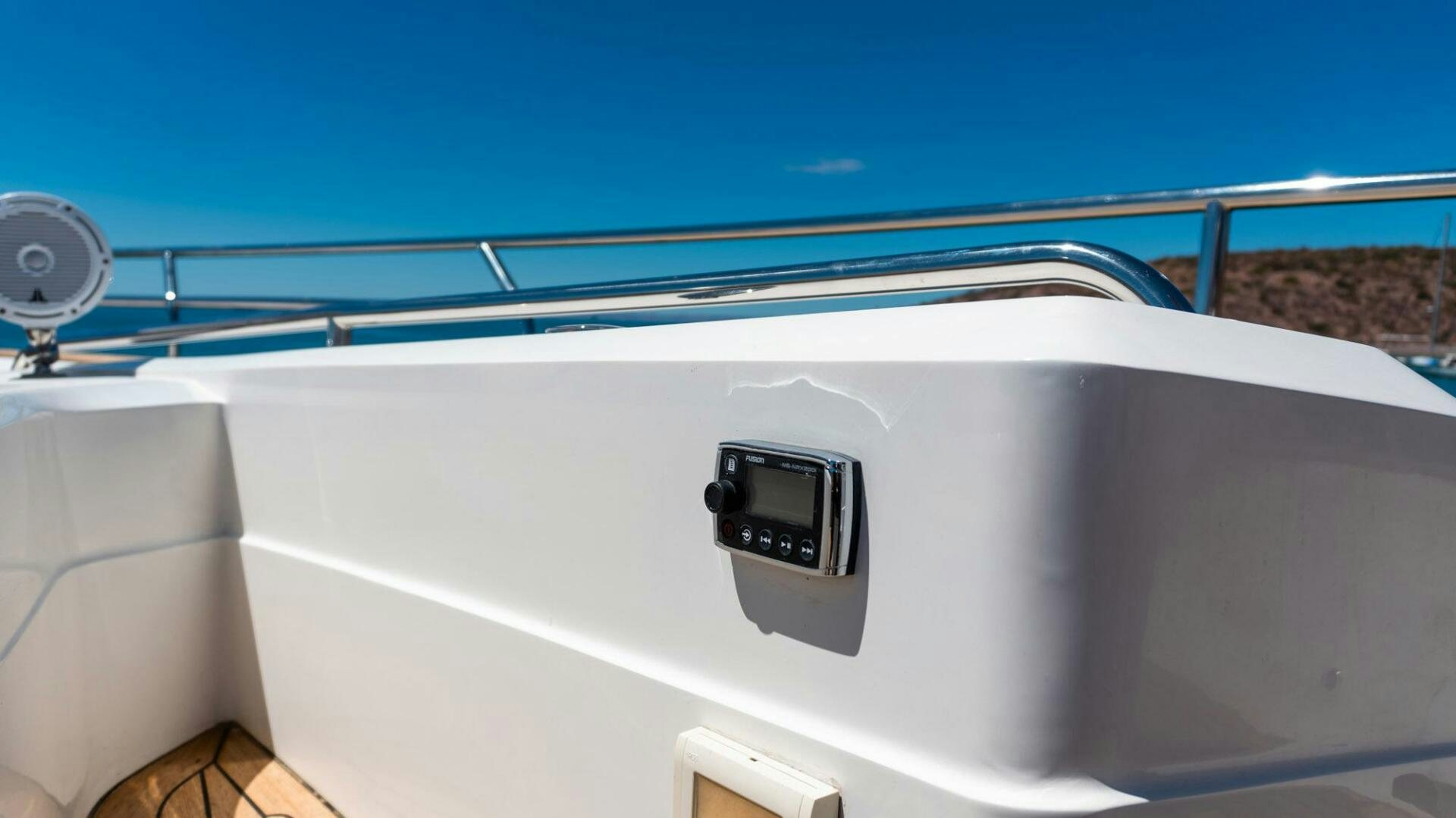 a white car with a black screen aboard SATORI Yacht for Sale