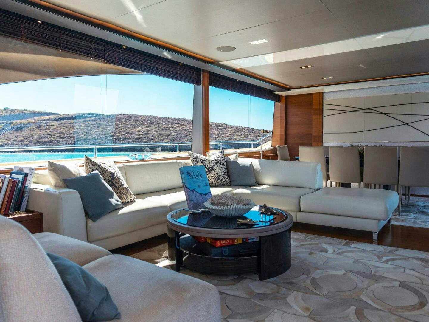 a living room with a large window aboard SATORI Yacht for Sale
