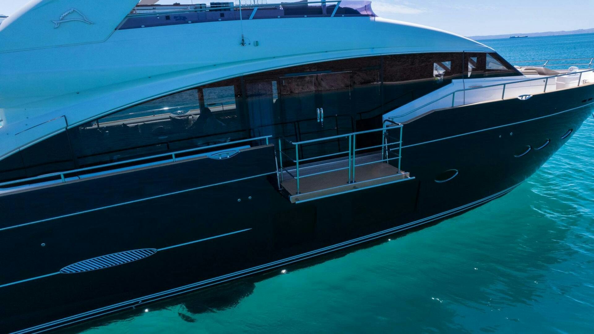 a large boat in the water aboard SATORI Yacht for Sale