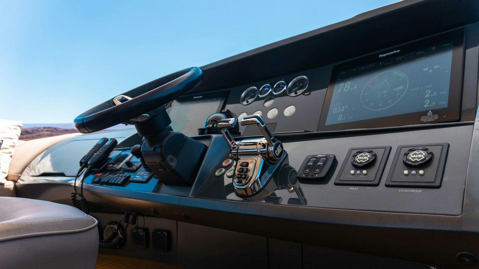 a car with a radio and other electronics on the dashboard aboard SATORI Yacht for Sale