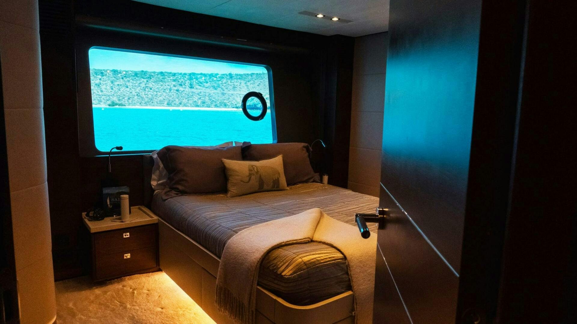a bed in a room aboard SATORI Yacht for Sale