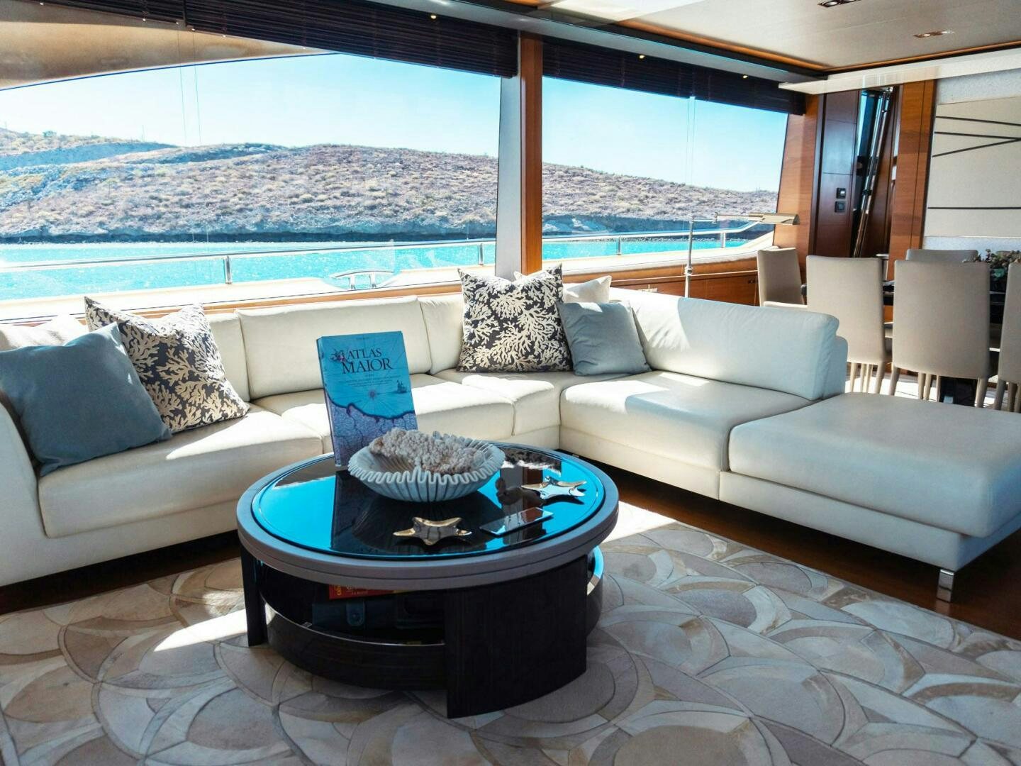 a living room with a large window aboard SATORI Yacht for Sale