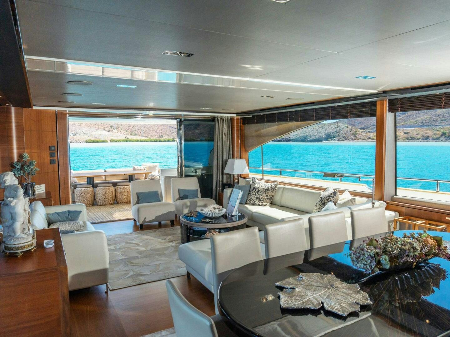 a living room with a large window aboard SATORI Yacht for Sale