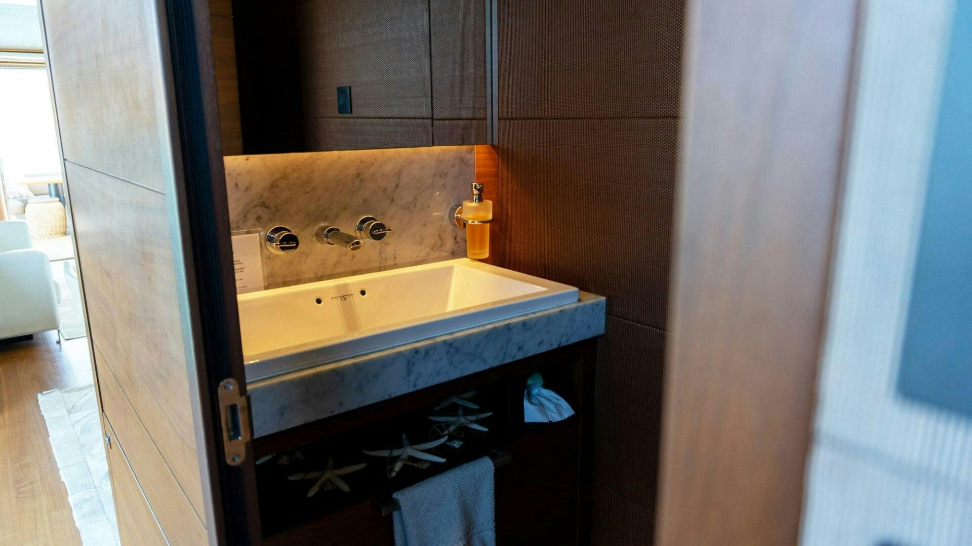 a bathroom with a tub sink and toilet aboard SATORI Yacht for Sale