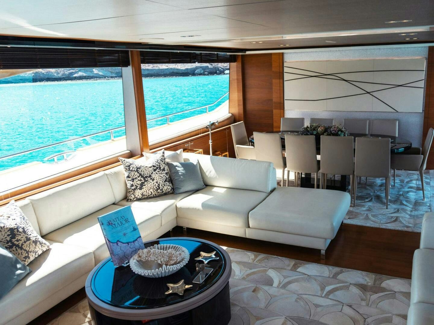 a living room with a large window aboard SATORI Yacht for Sale