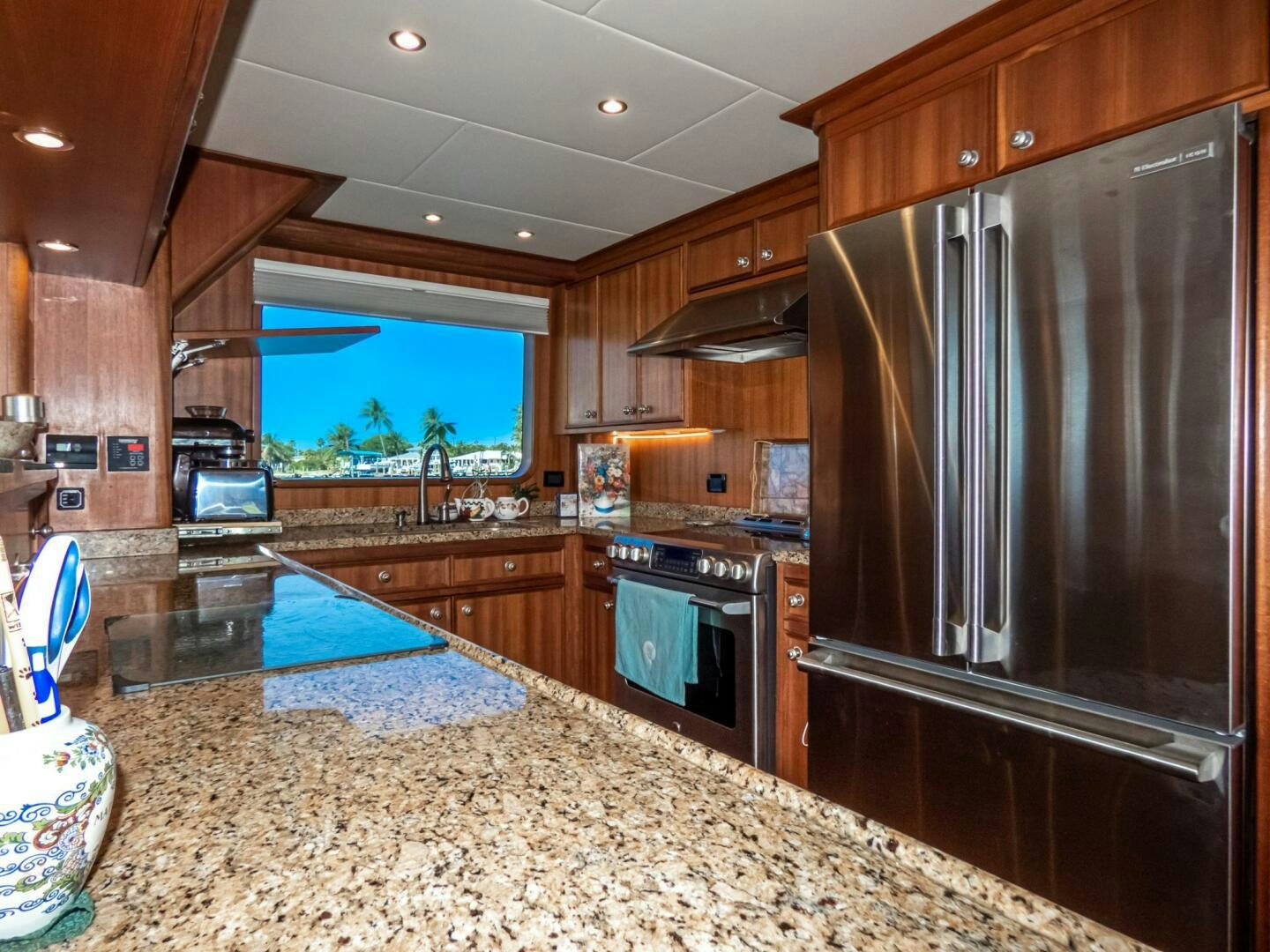 a kitchen with granite counter tops aboard IIWII Yacht for Sale