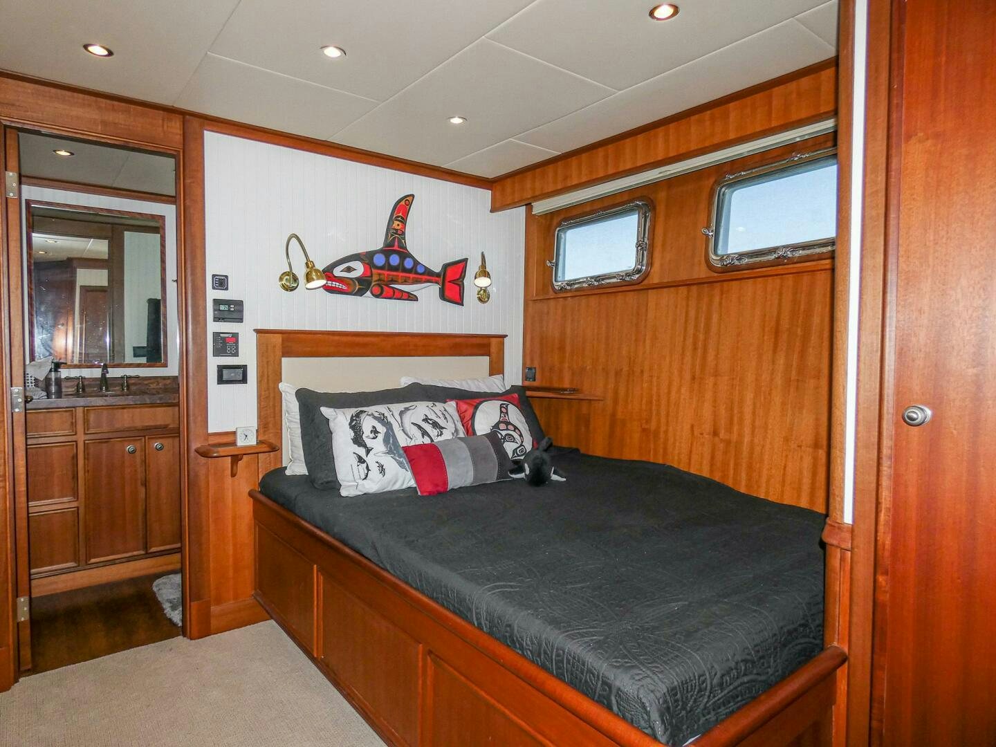 a bed in a room aboard IIWII Yacht for Sale