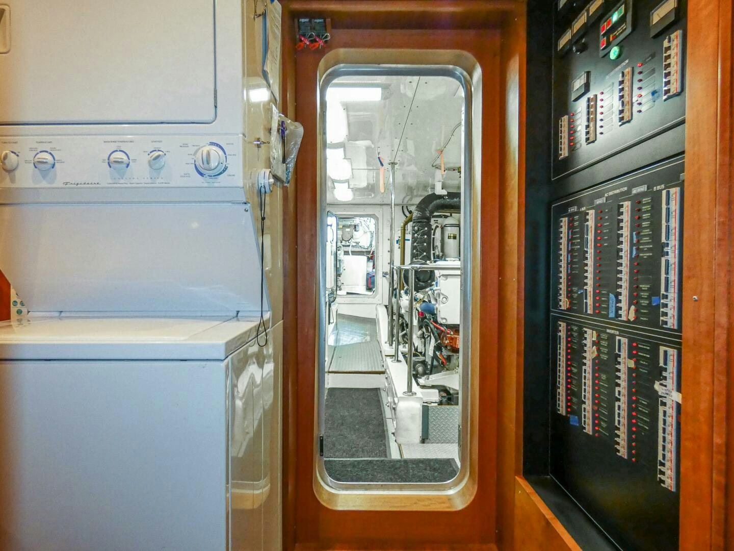 a computer room with a computer aboard IIWII Yacht for Sale