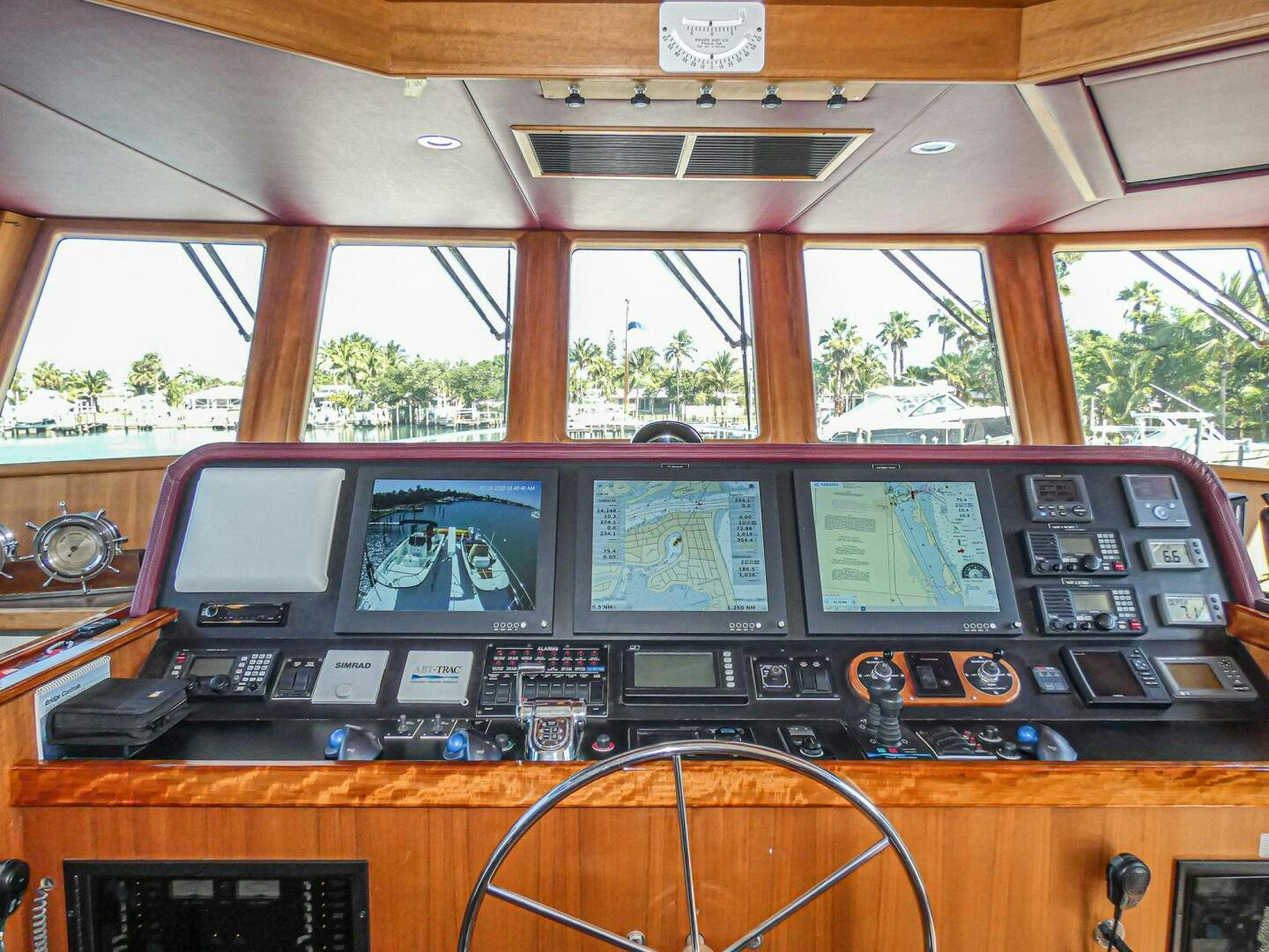a control panel with many monitors aboard IIWII Yacht for Sale