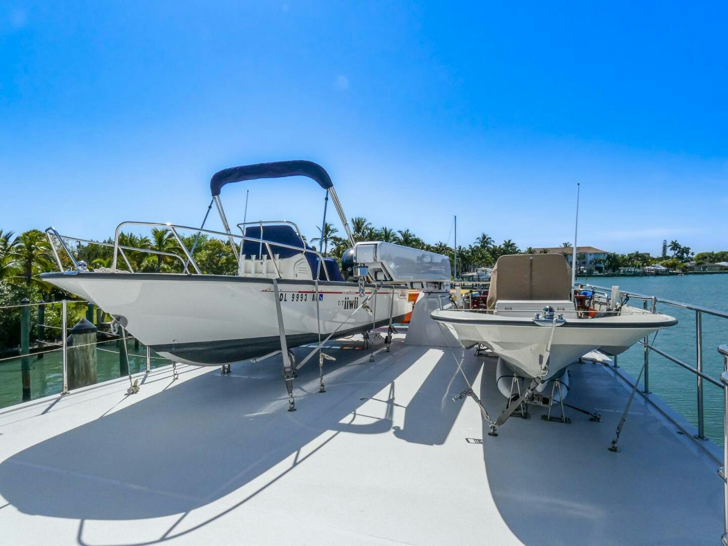 a boat docked at a pier aboard IIWII Yacht for Sale