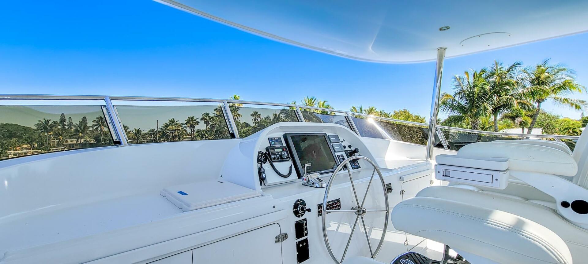 a white car with a windshield aboard IIWII Yacht for Sale
