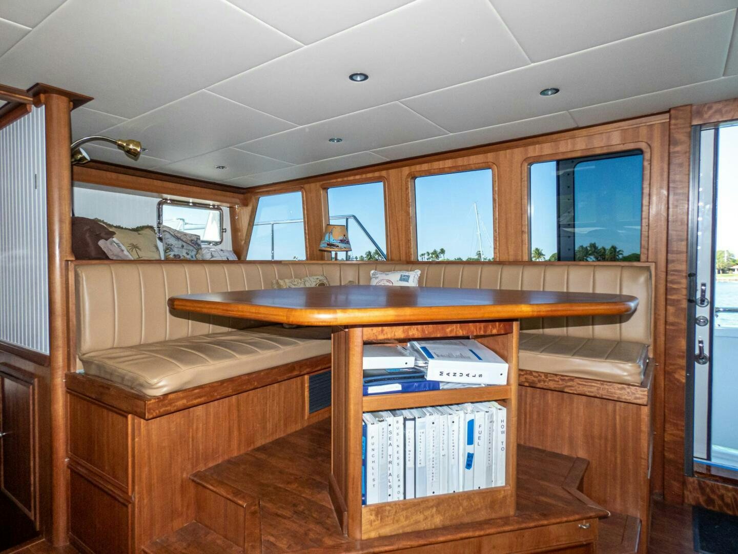 a room with a desk and a bookcase aboard IIWII Yacht for Sale