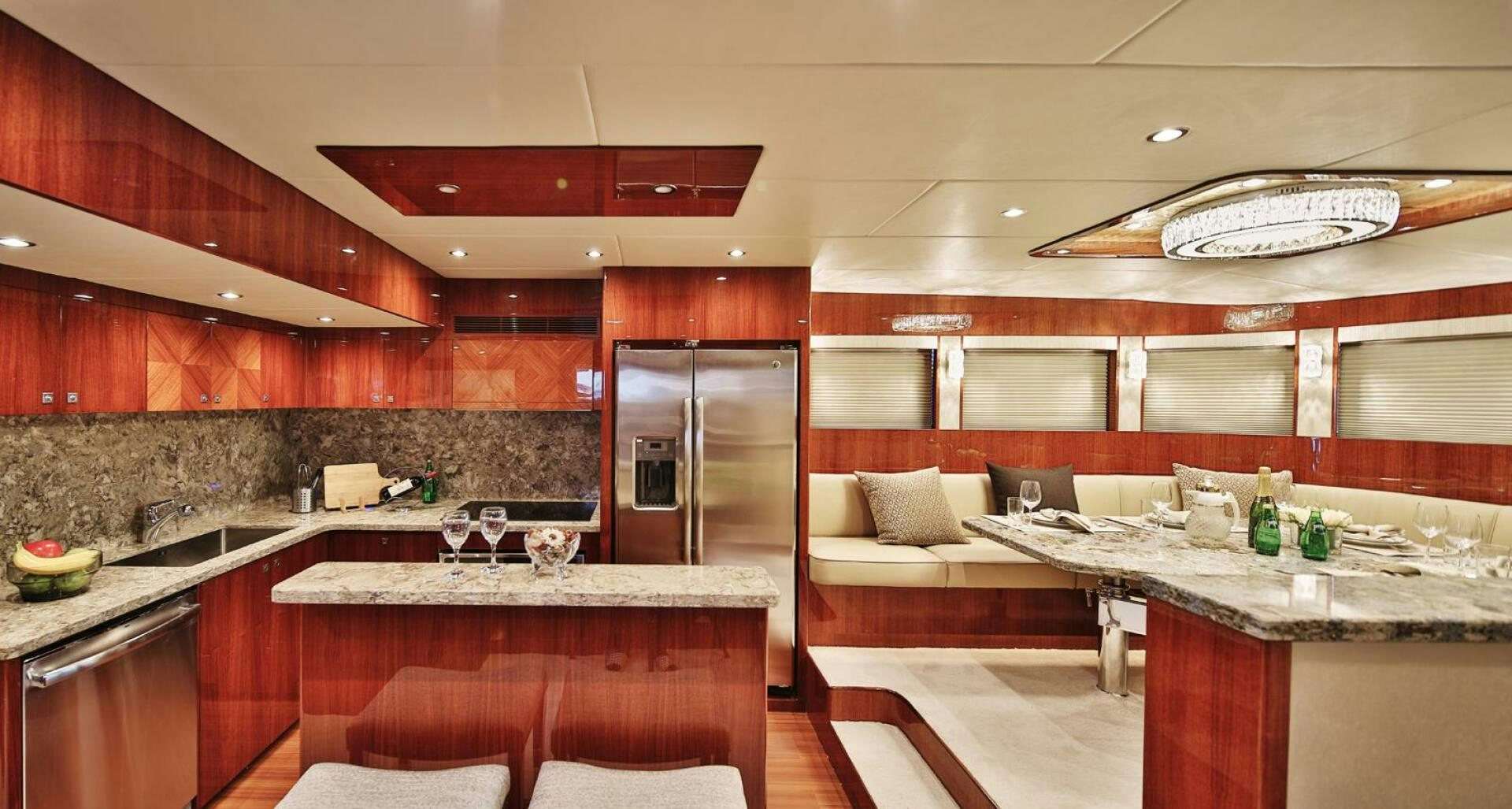 a kitchen with a large island aboard DEESCOVERY Yacht for Sale