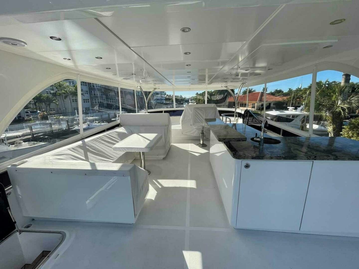 a large room with a pool aboard DEESCOVERY Yacht for Sale