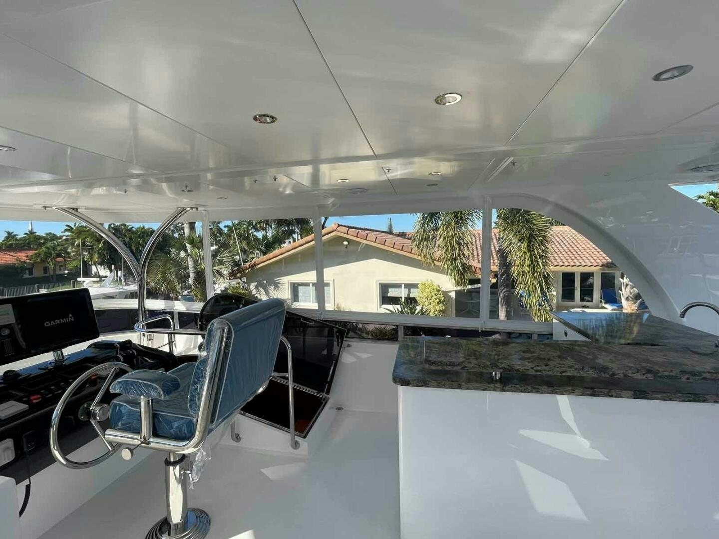 a room with a table and chairs aboard DEESCOVERY Yacht for Sale