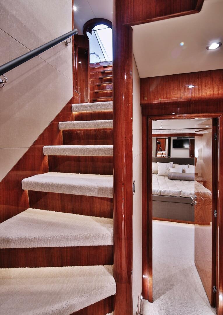 a bed in a room aboard DEESCOVERY Yacht for Sale