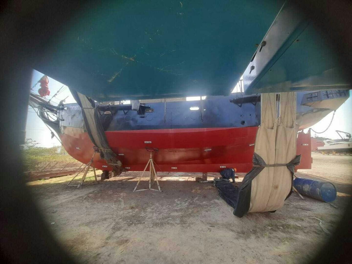 a plane parked in a hangar aboard LA FANTASTICA Yacht for Sale