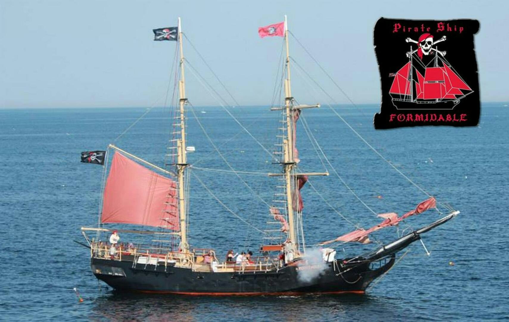 a boat with a flag on it aboard LA FANTASTICA Yacht for Sale