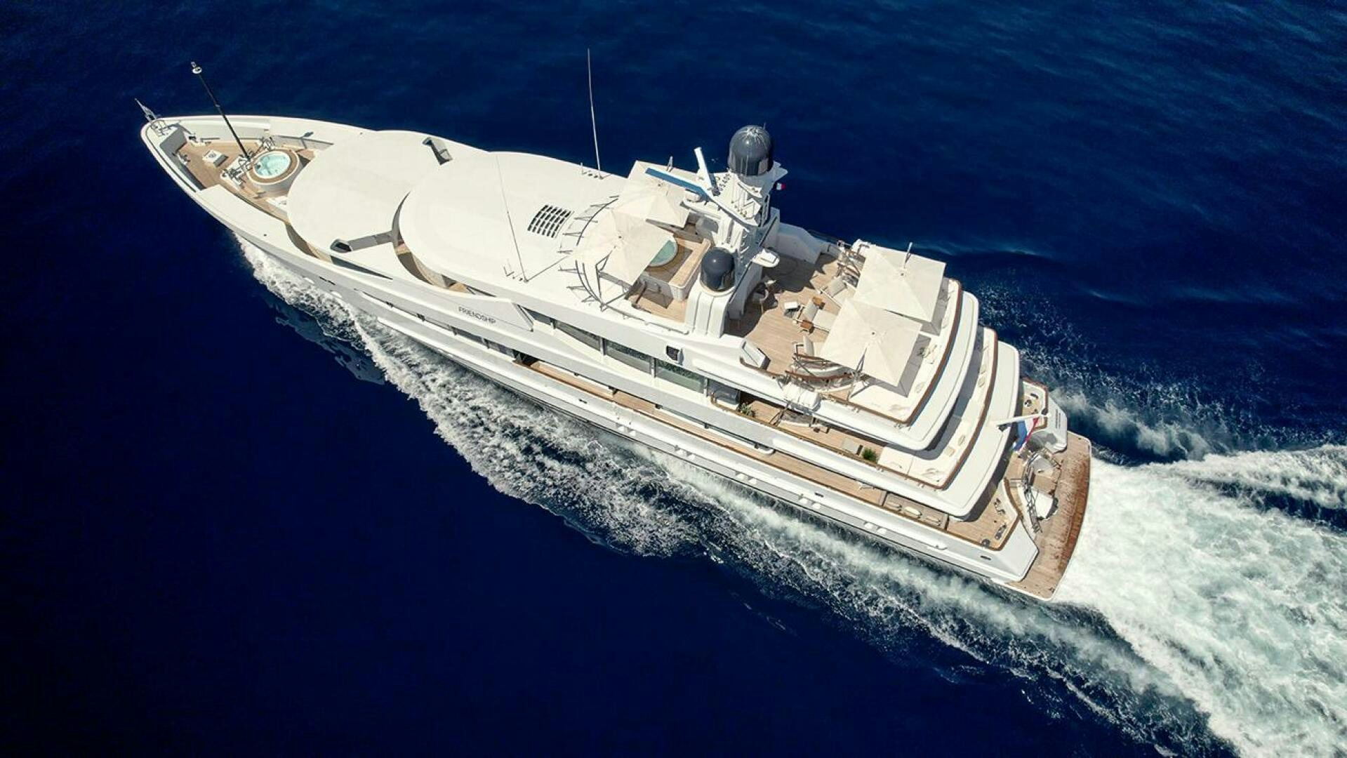 a ship in the ocean aboard FRIENDSHIP Yacht for Sale