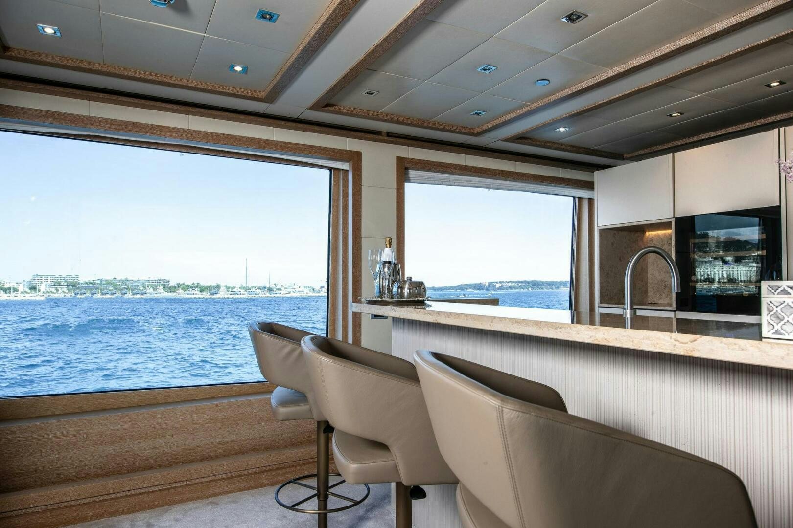 a room with a view of the ocean and a large window aboard FRIENDSHIP Yacht for Sale