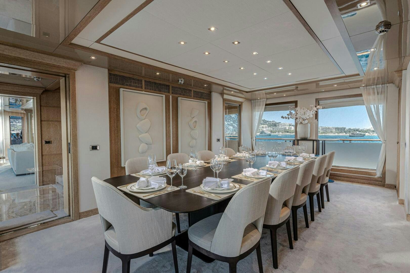 a dining room with a table and chairs aboard FRIENDSHIP Yacht for Sale