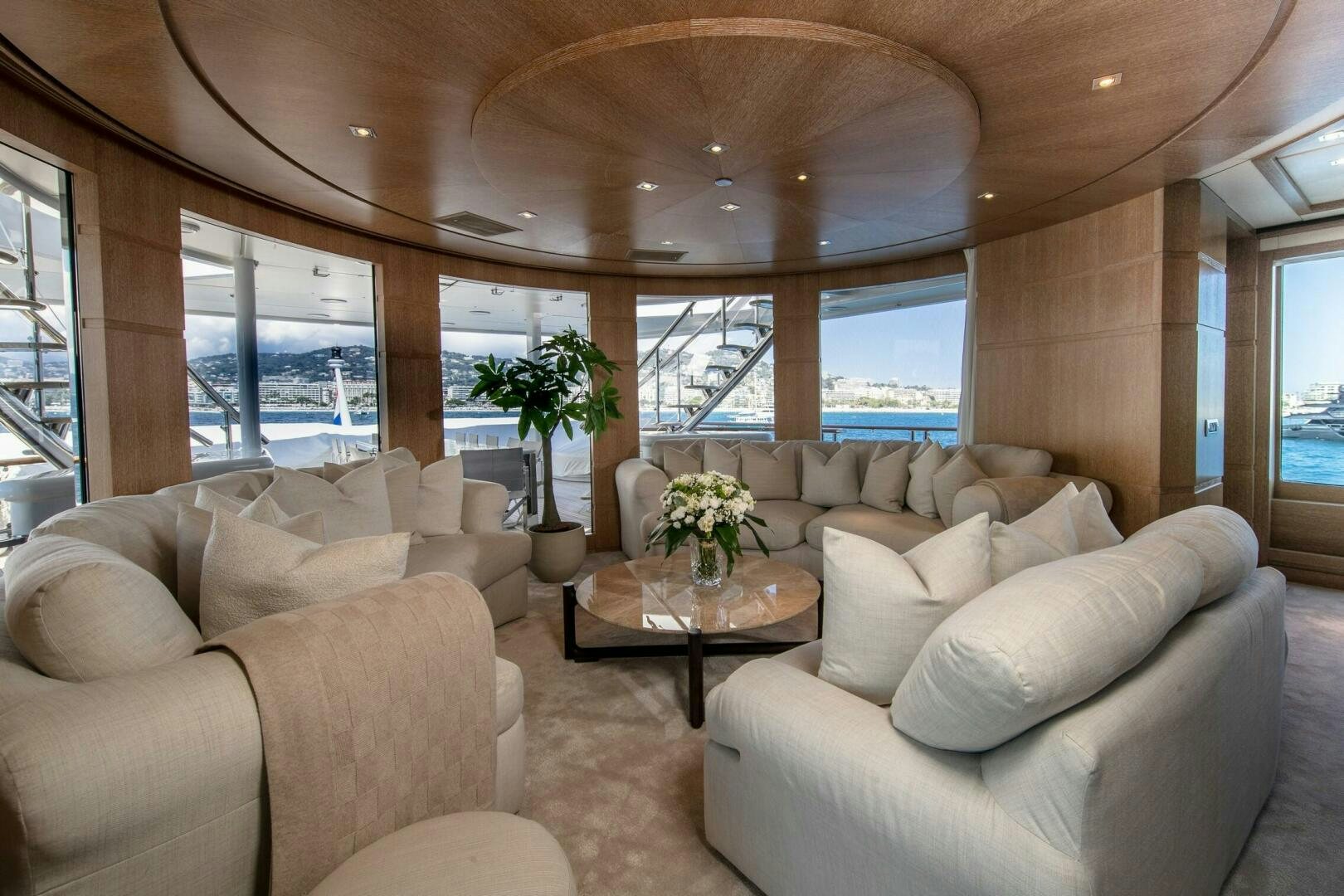 a living room with a large window aboard FRIENDSHIP Yacht for Sale