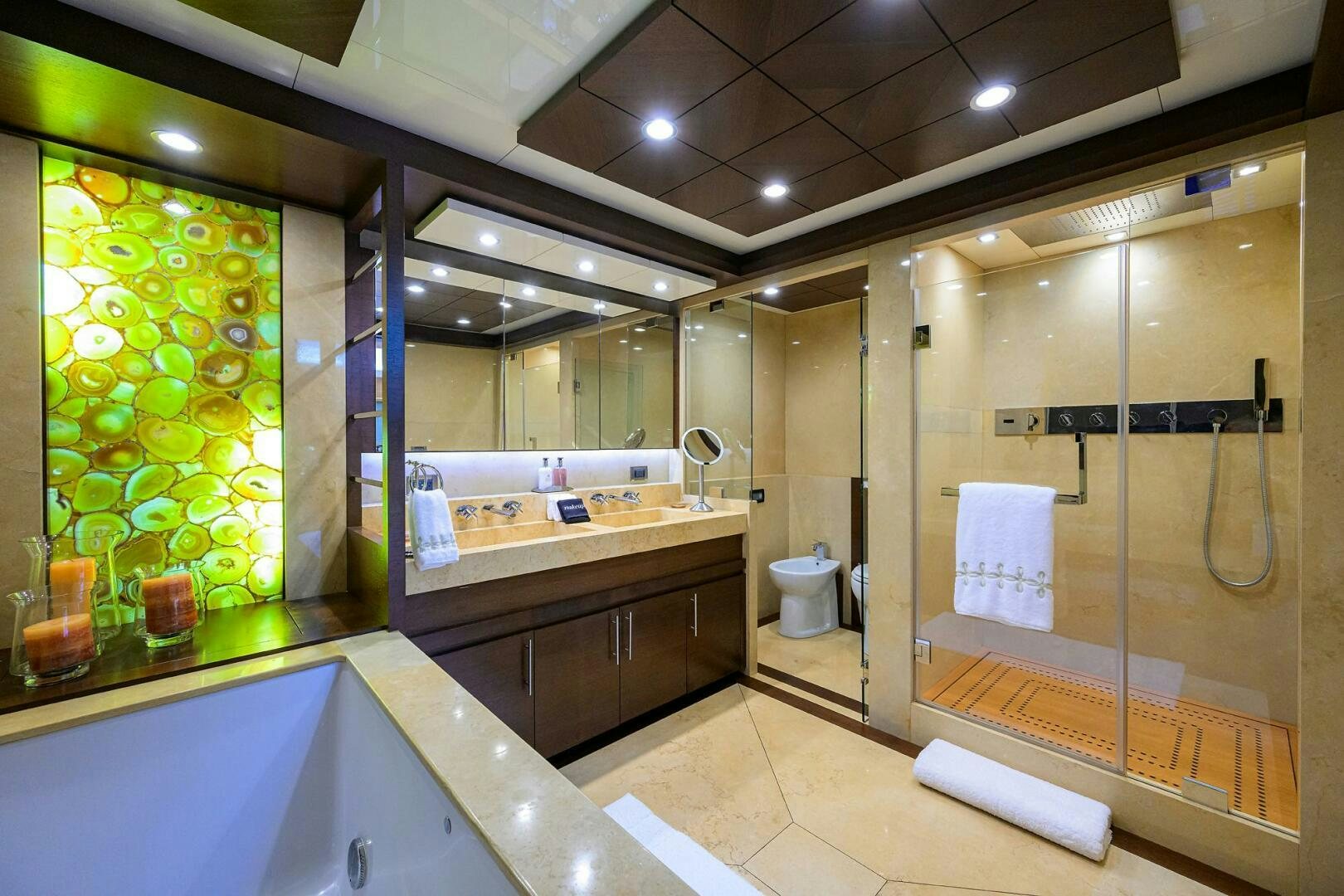 a bathroom with a glass shower aboard KIMBERLIE Yacht for Sale
