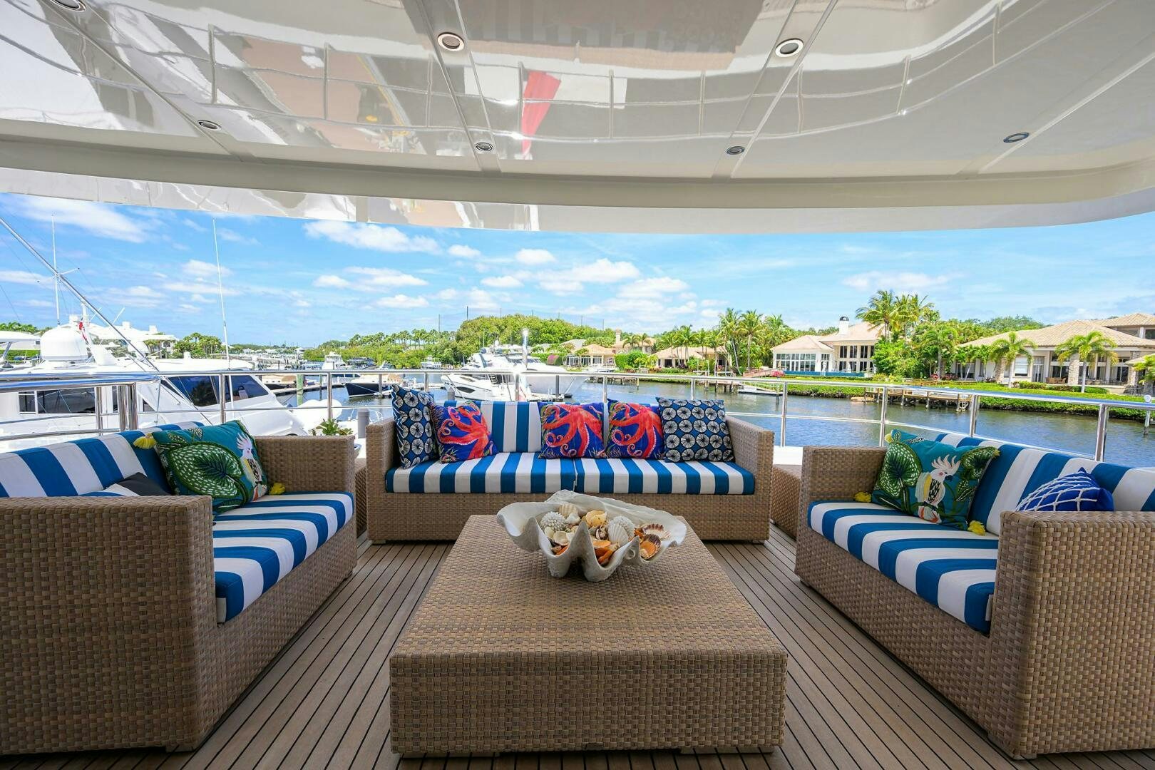 a patio with couches and a pool aboard KIMBERLIE Yacht for Sale