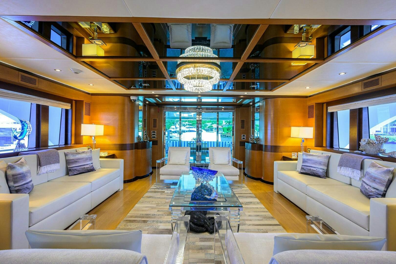 a living room with a large glass ceiling aboard KIMBERLIE Yacht for Sale