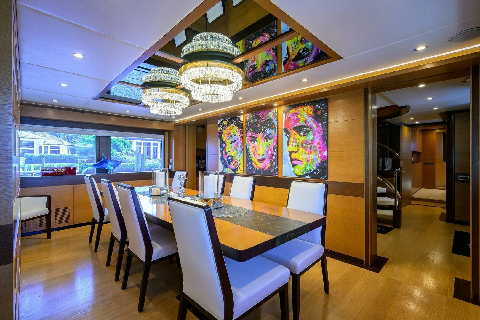 a room with a table and chairs aboard KIMBERLIE Yacht for Sale