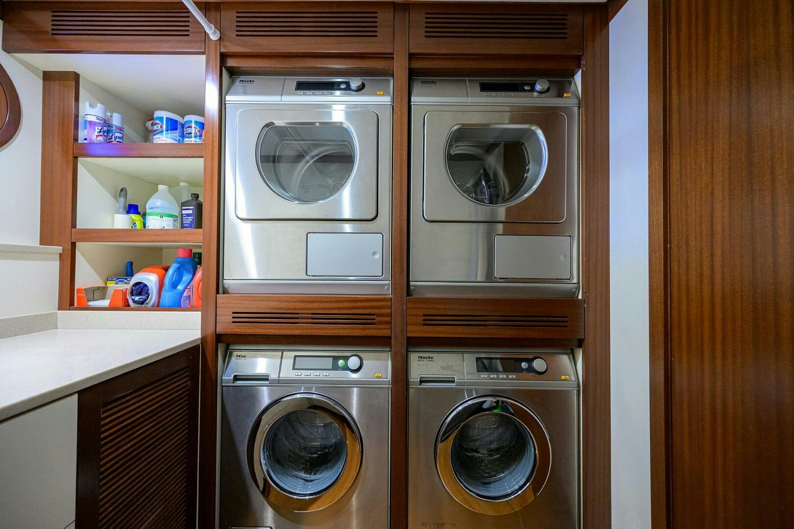 a kitchen with a washer and dryer aboard KIMBERLIE Yacht for Sale