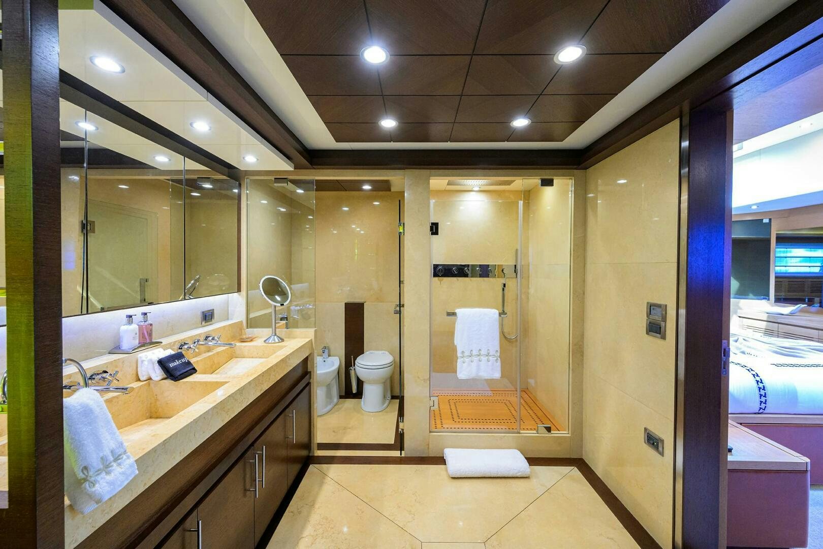 a bathroom with a large mirror aboard KIMBERLIE Yacht for Sale