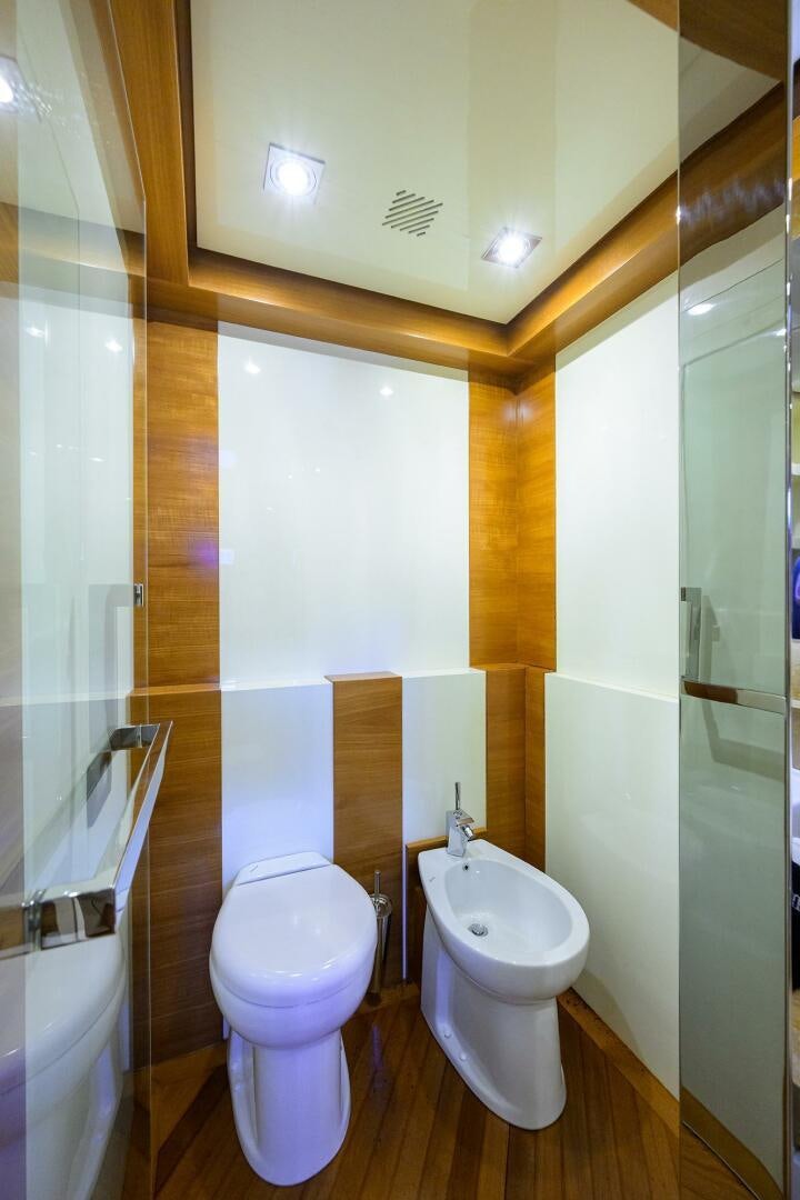 a bathroom with a toilet and sink aboard KIMBERLIE Yacht for Sale