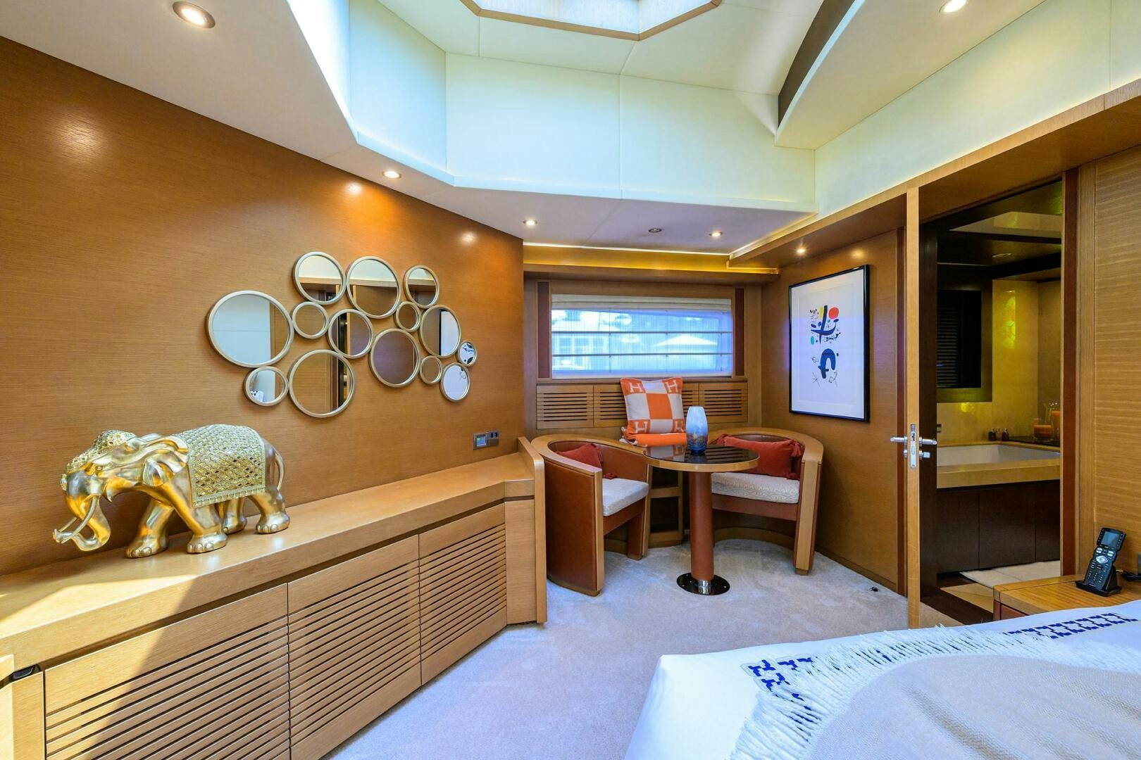 a room with a bed and a desk aboard KIMBERLIE Yacht for Sale