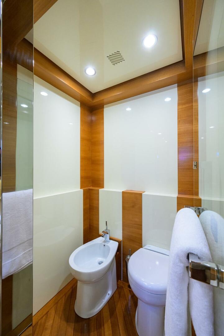 a bathroom with a toilet and sink aboard KIMBERLIE Yacht for Sale